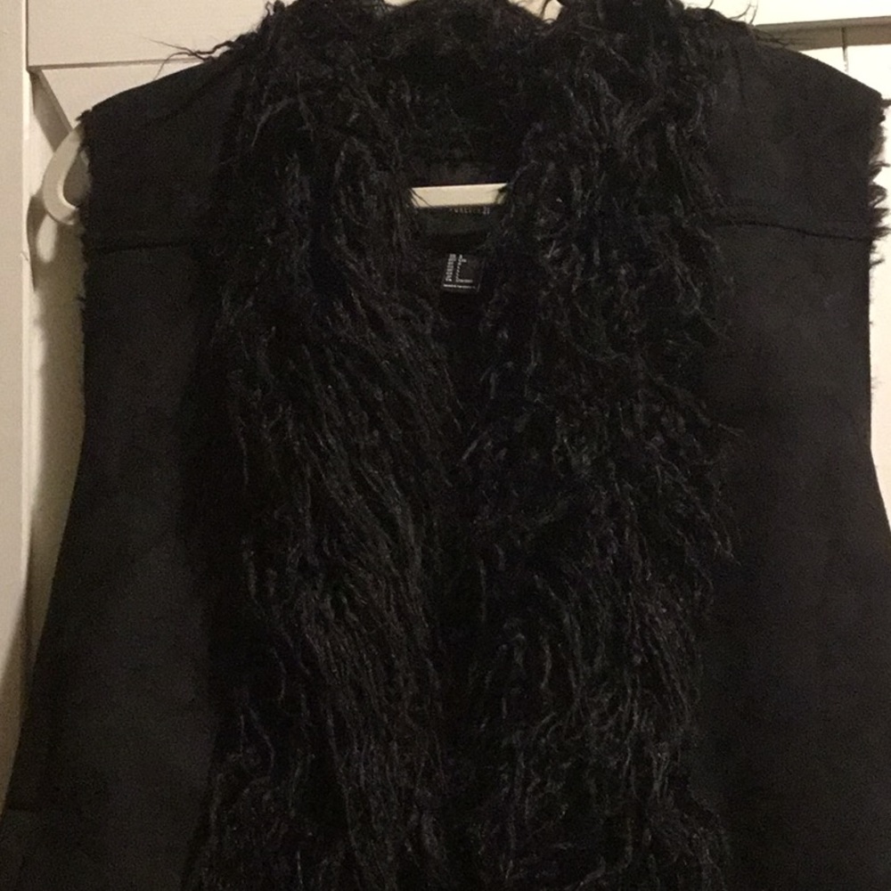 Black vest with fur collar